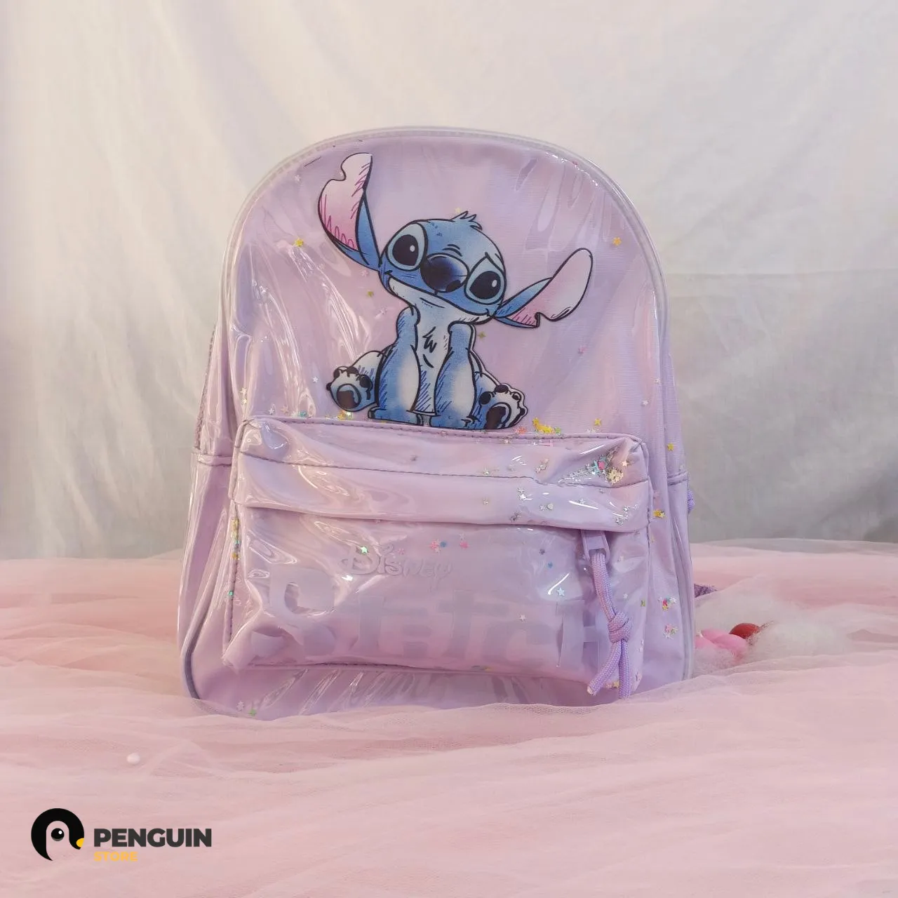 شنطة ضهر "ستيتش" شفافة لامعة - حقيبة ديزني لافندر بالجليتر وتصميم 3D فريد 👾✨